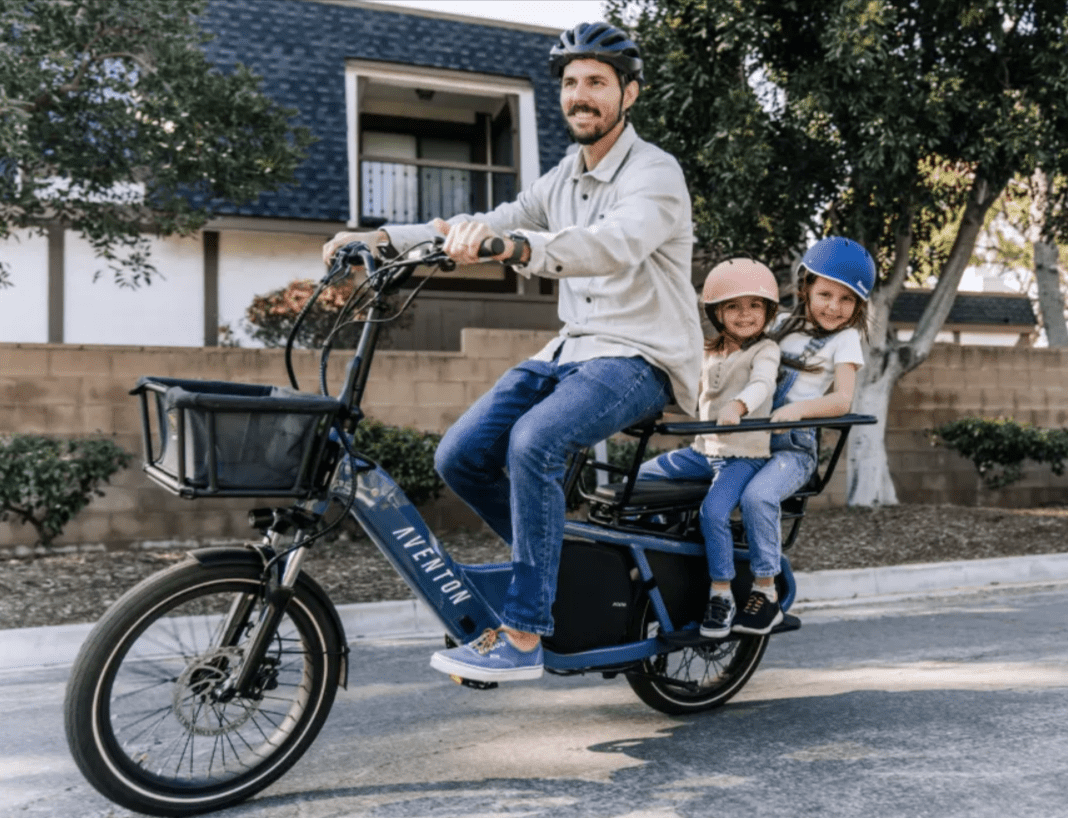 Aventon Abound supports man riding with two children