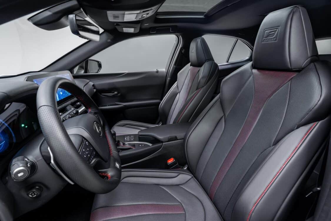2024 Lexus UX 250h interior, front driver and passenger seats, and steering wheel