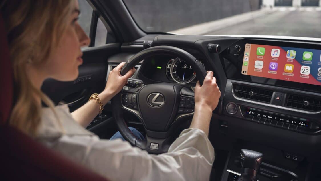 2024 Lexus UX 250h interior, F Sport steering wheel and infotainment system