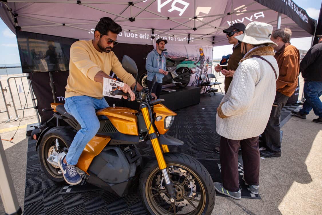 Photo of attendee on Ryvid electric bike at Electrify Expo