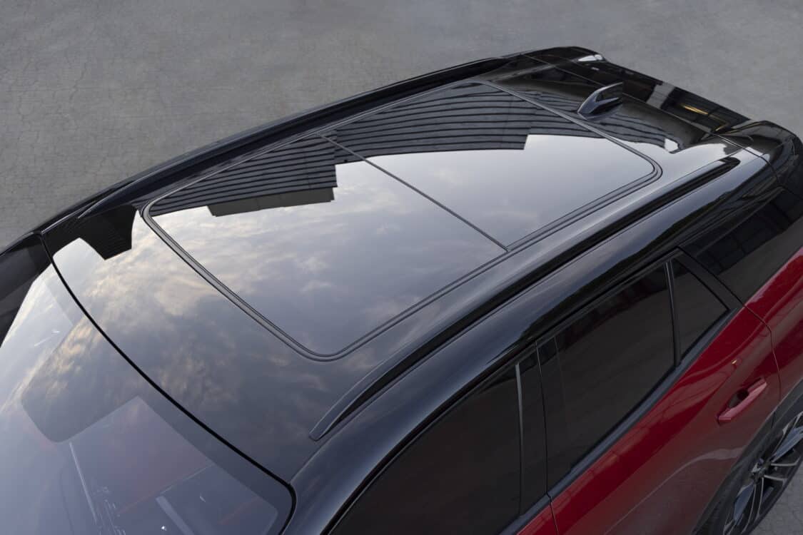 Photo of Overhead view of black sunroof on 2024 Chevrolet Blazer EV SS in Radiant Red Tintcoat. Preproduction model shown. Actual production model may vary. 2024 Chevrolet Blazer EV available Spring 2023.