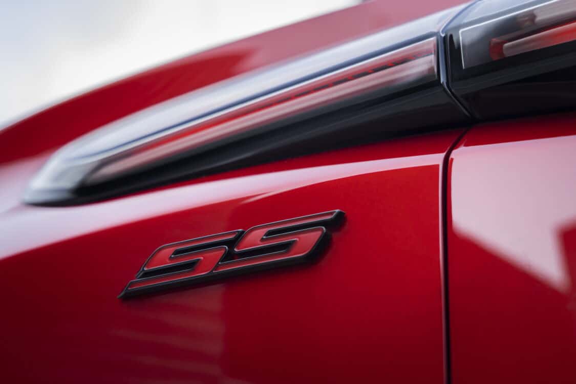 Photo of Close up of SS badge under passenger’s side taillight on 2024 Blazer EV SS in Radiant Red Tintcoat. Preproduction model shown. Actual production model may vary. 2024 Chevrolet Blazer EV available Spring 2023.