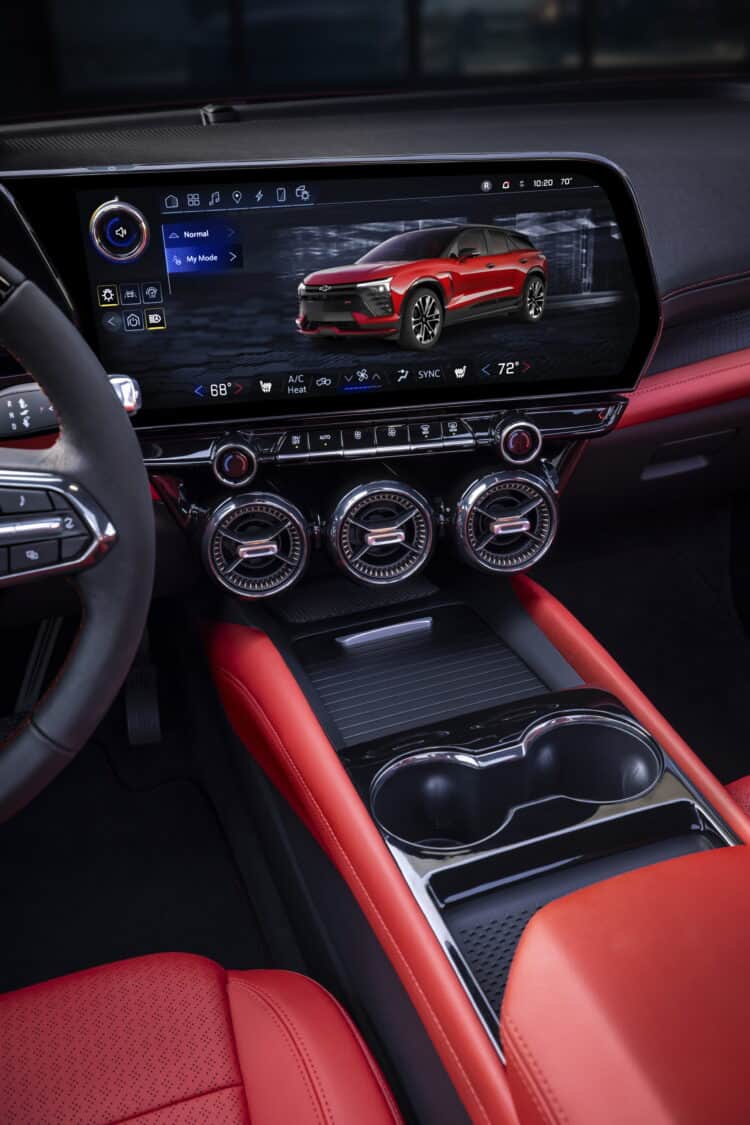 Photo of Front view of infortainment touchscreen and center console on 2024 Chevrolet Blazer EV SS, with Adrenaline Red interior. Preproduction model shown. Actual production model may vary. 2024 Chevrolet Blazer EV available Spring 2023.