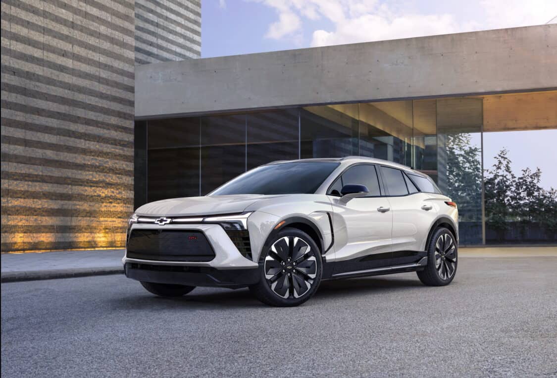 Photo of Seven-eighths view of 2024 Chevrolet Blazer EV RS in Iridescent Pearl Tricoat. Preproduction model shown. Actual production model may vary. 2024 Chevrolet Blazer EV available Spring 2023.