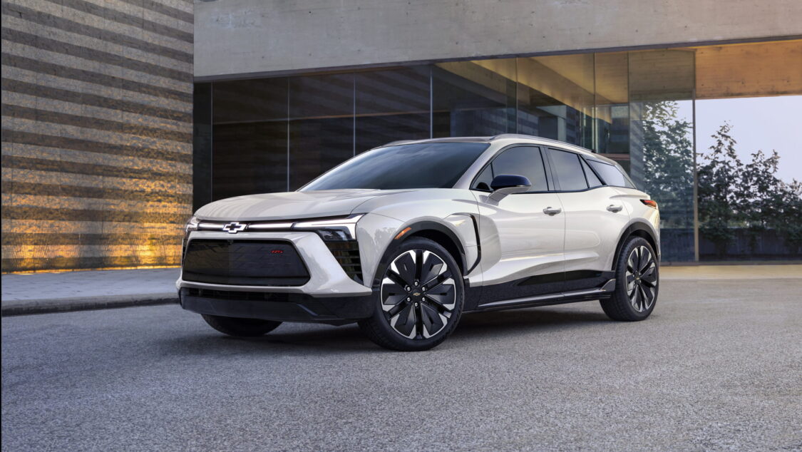 Photo of Seven-eighths view of 2024 Chevrolet Blazer EV RS in Iridescent Pearl Tricoat. Preproduction model shown. Actual production model may vary. 2024 Chevrolet Blazer EV available Spring 2023.