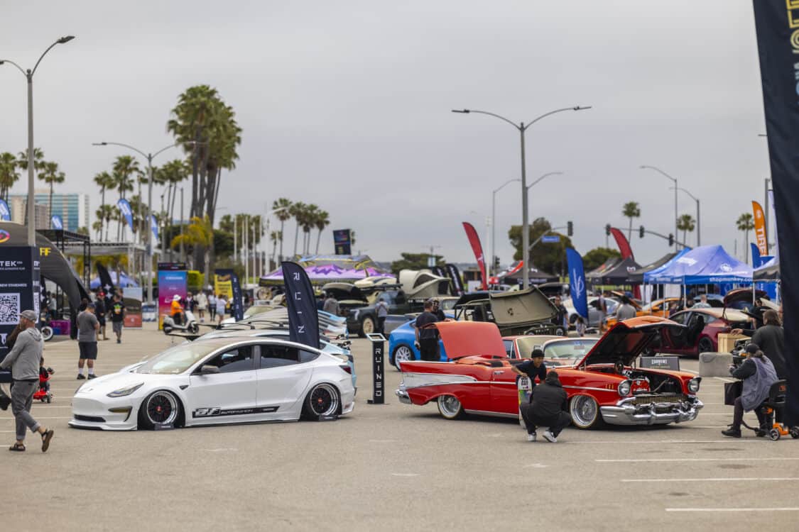 Photo of Americus Cuevas JDM VIP Bippu 2018 Tesla Model 3 LR RWD from Ruined EV modified with Thor Electronic Exhaust Management System (Dual), 12-Volt Battery (lithium) provided by Buddy Club USA – MEGALife Battery, 19” BBS LM Wheels, Yokohama Advan Sport V107 Tires - 235/35/19 (f), 255/35/19 (r), C7 6-Piston Brembo Brake Conversion/ 370 mm BBK by Don Marconi, Universal Air Suspension Struts, Air Lift 3P Management w/ 5 gal Seamless Air Tank, VIAIR 444c Compressors (2), LOSTAR Aluminum Magnesium Alloy Skid Plates, Artisan Spirits Sports Line Black Label EVS Widebody, WellVisors Window Visors, Carbon Fiber M3 Style Side Mirrors, Electric Speed Design Carbon Fiber Mud Guards, Electric Speed Design Carbon Fiber Door Handle Covers (Painted PPW), Electric Speed Design Carbon Fiber Side Marker Covers, Robot Craftsman Multi LED Taillights (1 of 2 in the world), LowGlow Undercar LED Kit, Ghozt Lighting Module, AutoFasion Window Curtains, Broadway Mirror 300mm Convex Wide, Junction Produce Carbon VIP Tables, Junction Produce Tsuna Knot (Silver), Junction Produce Fusa Shield Emblem (Bronze), Junction Produce Katana Shift Knob 20cm (Black), Junction Produce Hannya Charm (Red Mask), Junction Produce Kyoto Fan (Black/Red), Junction Produce Tissue Box Cover (Black), Junction Produce Crystal Ashtray (Round), Junction Produce Throw Pillow Cushion (Black), Junction Produce Seat Cushion (Black), Junction Produce Missions Neck Pad V1 (Black), Junction Produce x DAD VIP Air Freshener (Crown), Air Spencer Squash x4, Electric Speed Design Carbon Fiber Dash, Electric Speed Design Carbon Fiber Window and Door Switch Kit, Electric Speed Design Carbon Fiber Center Console kit, Electric Speed Design Carbon Fiber Armrest Cover, Electric Speed Design Carbon Fiber Dome Light Covers, Electric Speed Design Carbon Fiber Stalk Covers, Inch Empire Seat and Flooring (Wine Red), Aroham D-Line Yoke Steering Wheel, Opelite Optics 600 Stars with shooting stars, Suede headliner reupholstery, Orella Acoustics Tesla Model 3 Speaker Upgrade, Hansshow 7.2” Rear Entertainment & Climate Control Display