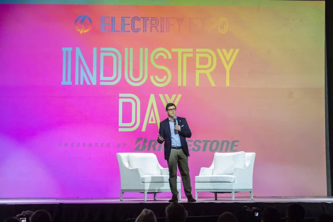 Photo of Riccardo Cichi, Bridgestone President & Chief Sales Officer, speaking at Electrify Expo: Industry Day 2023