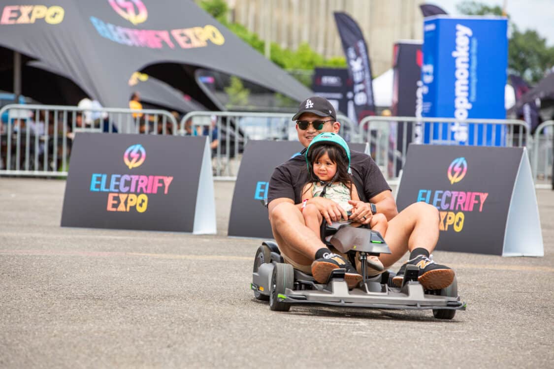 Photo of Electrify Expo in Washington DC. Over 13,000 demo rides! Father and daughter test ride gokart