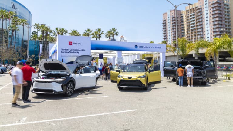 Toyota bZ4X and RAV4 PHEV electric SUVs, and Grand Highlander Hybrid displayed at Electrify Expo