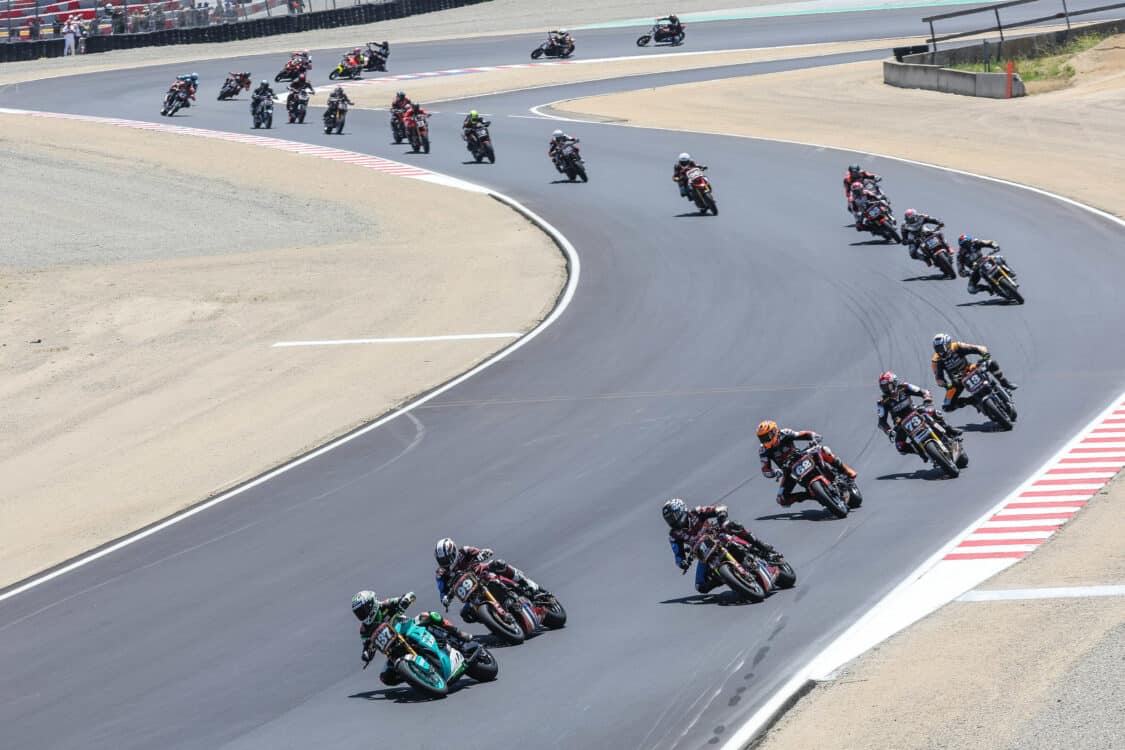 Photo of Energica beats outright electric lap record at Laguna Seca by Stefano Mesa aboard an Eva Ribelle RS motorcycle.