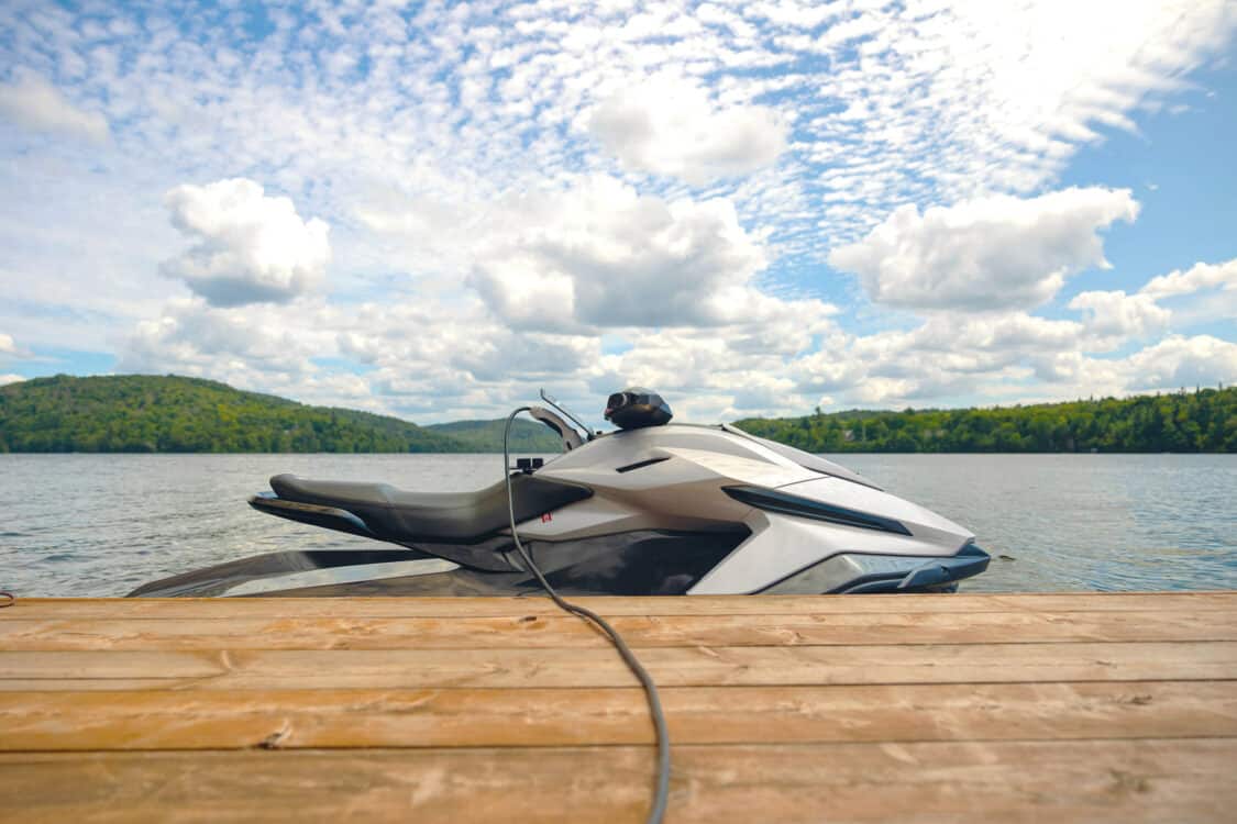 Photo of Taiga Orca Carbon PWC charging on a dock.