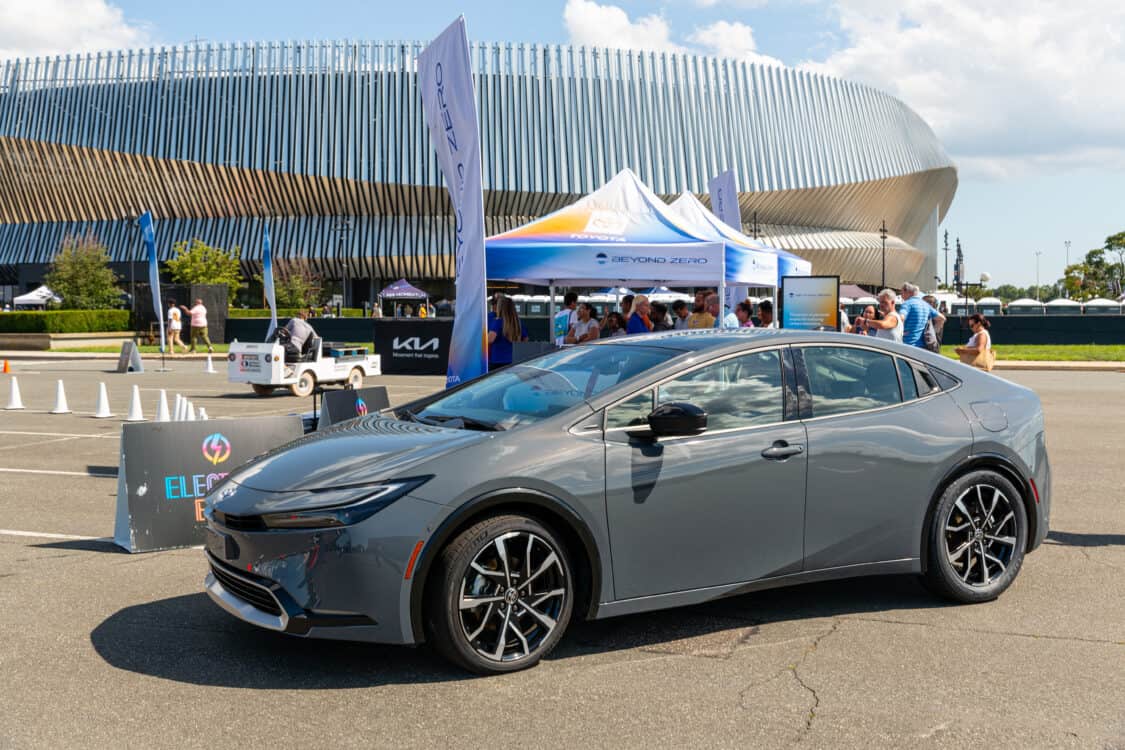 Photo of attendees test driving a Toyota Prius at Electrify Expo in New York
