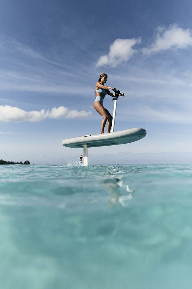 woman riding fliteboard hydrofoil