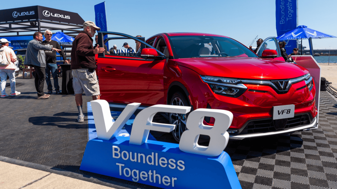 Image showcasing VinFast VF 8 in red and "Boundless Together" slogan on a sign at Electrify Expo San Francisco