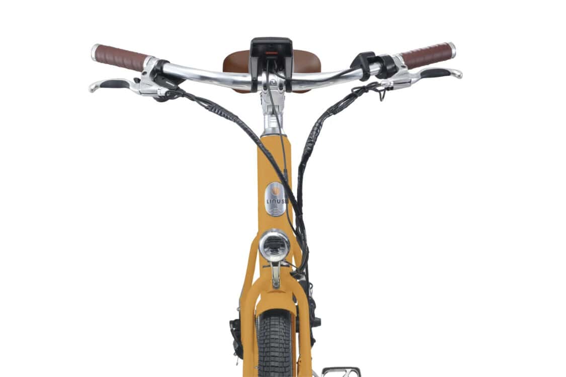 Image showcasing Linus Cesta 500 electric bike in mustard
