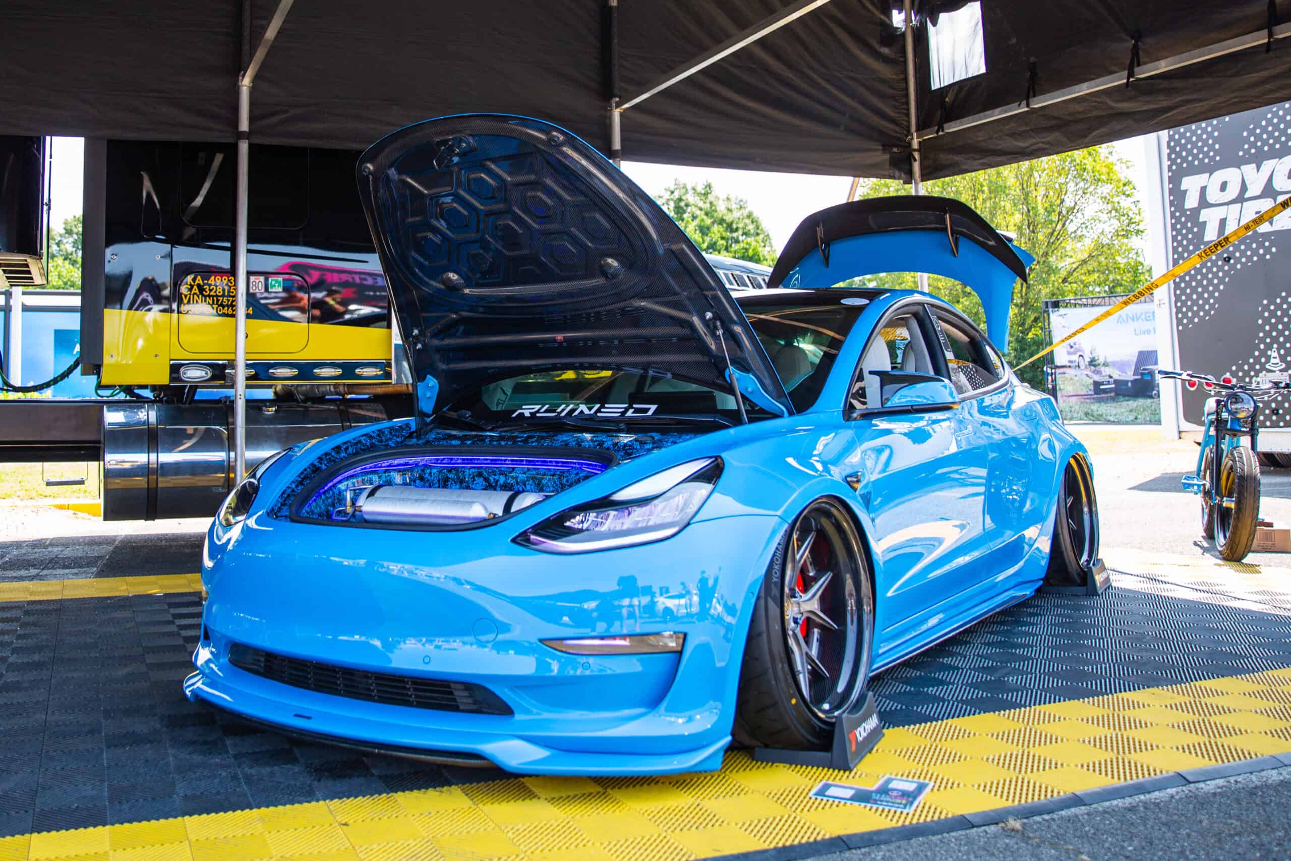 Image showcasing AJ Velasco 2020 Tesla Model 3 Performance at Electrify Expo Showoff in the Meguiar's booth
