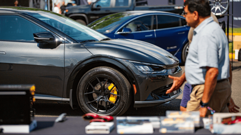 Image showcasing Jeff Blake's 2022 Kia EV6 Wind AWD with Titan 7 T-S5 Wheels at Electrify Showoff in Washington, DC