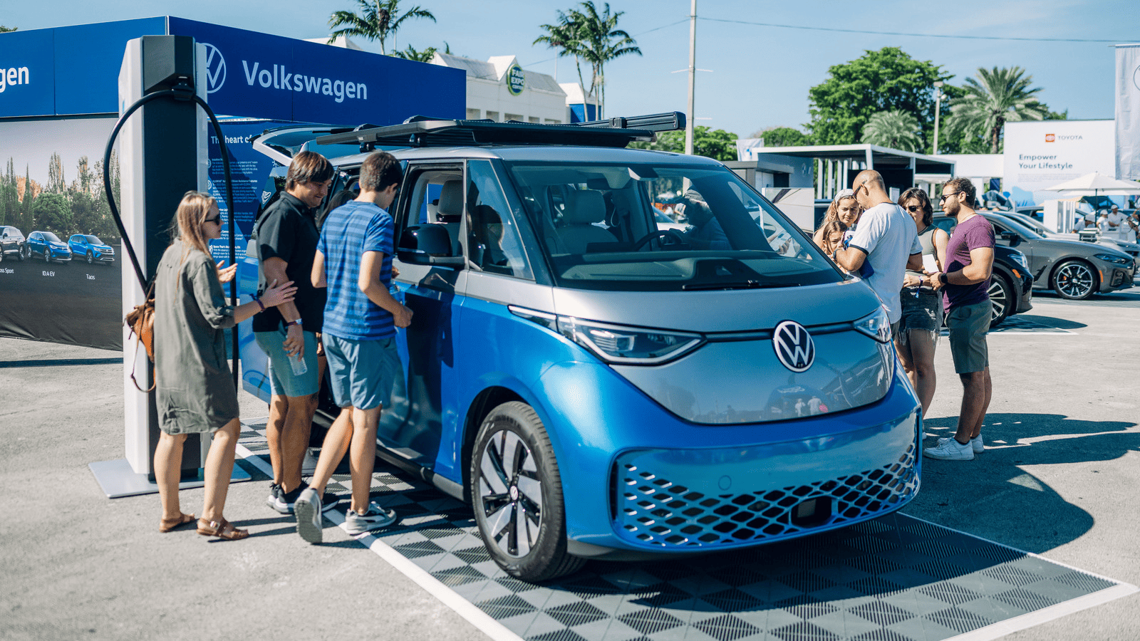 Image showcasing Volkswagen ID.Buzz and EV charger at Electrify Expo in Miami