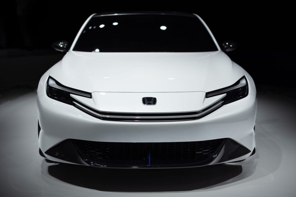 Image showcasing Honda Prelude hybrid electric concept car front headlight at Japan Mobility Show 2023