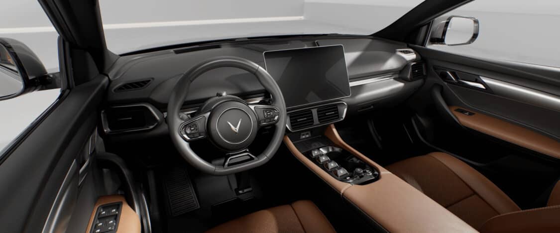 Image showcasing VF-8 interior with vegan leather upholstery, 15.6-inch touchscreen infotainment screen with Alexa Voice Assistant and navigation