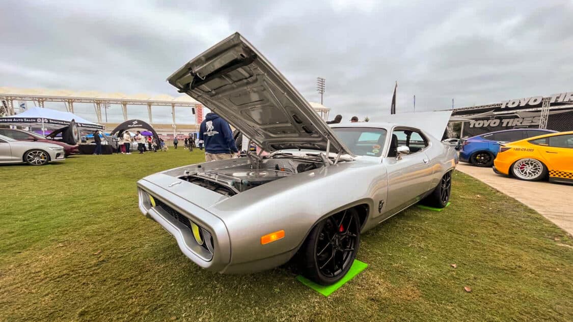 Image showcasing Kevin Erickson's 1972 Plymouth Satellite at Electrify Showoff in Austin