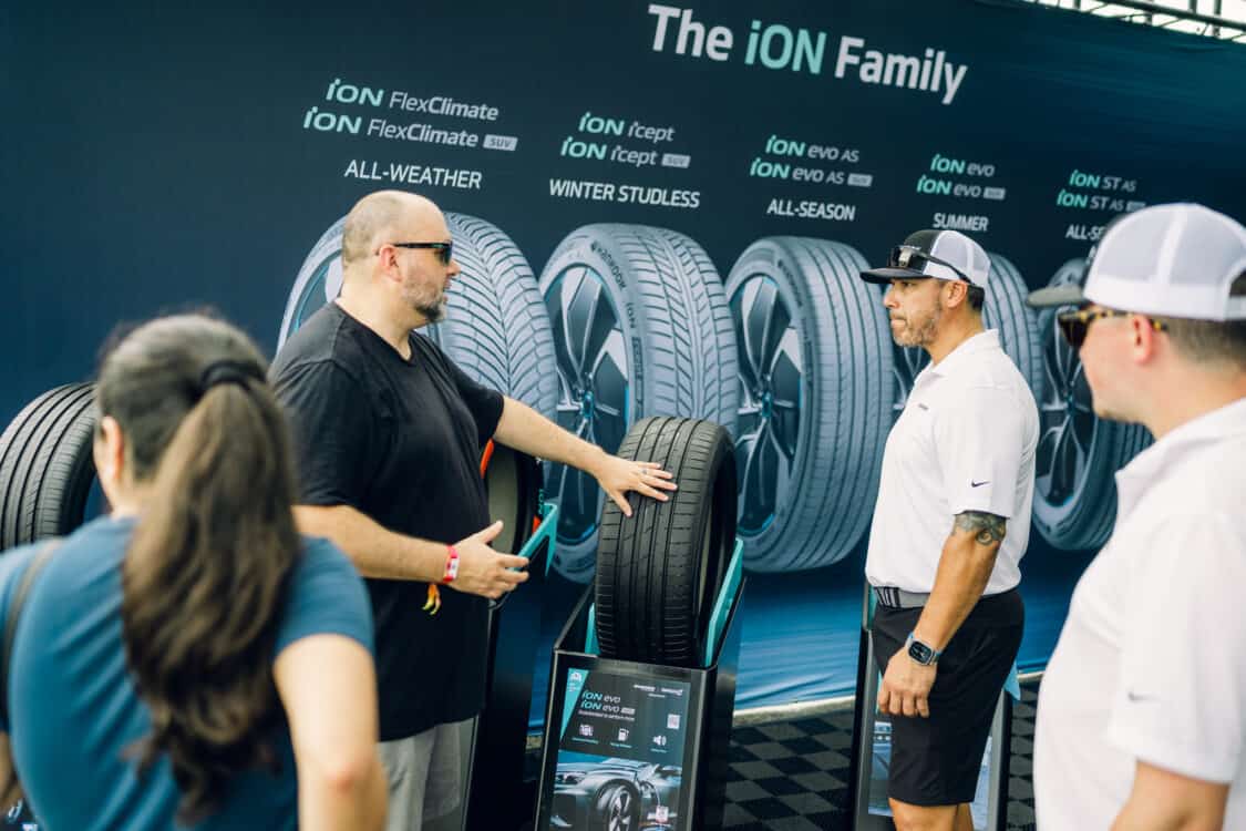 visitor at electrify expo shows interest in hankook's ion evo tire exclusive for EV