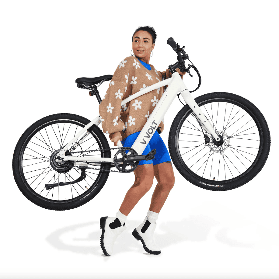 Image showcasing woman with VVolt E-Mobility Alpha Chalk White electric bike