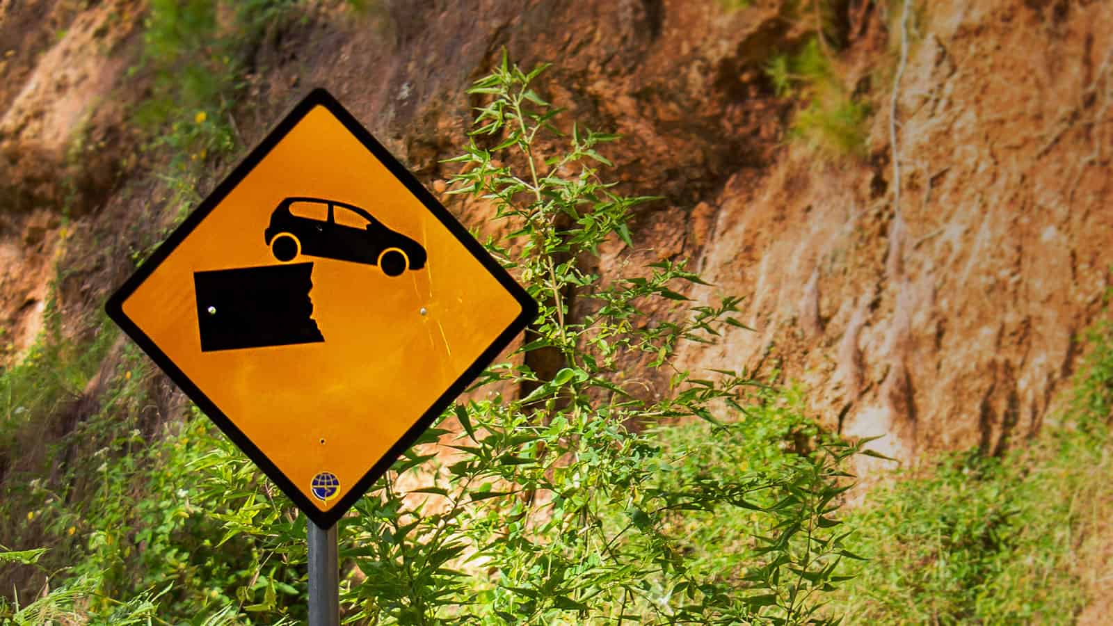 Image of a sign warning that road ends. Shockingly, EVs are not more likely to be a total loss even if you aren't paying attention to signs like this.