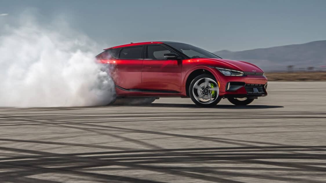 Kia EV6 GT, image shows car doing donuts in an open lot, receives 2 new accolades