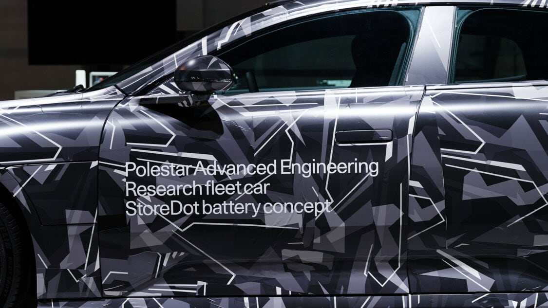 Side view of car with the text "Polestar Advanced Engineering Research Fleetcar StoreDot Battery Concept" on door