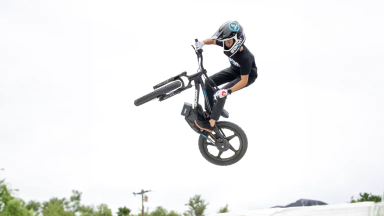 Kid gets some mighty air with a stacyc balance ebike, great holiday idea