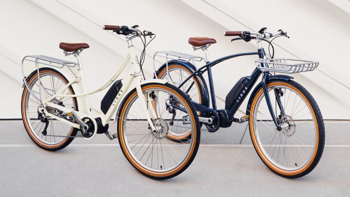 Image showcasing Linus Bikes Felix e6100 electric bike 90-Mile Range - white and blue side profile
