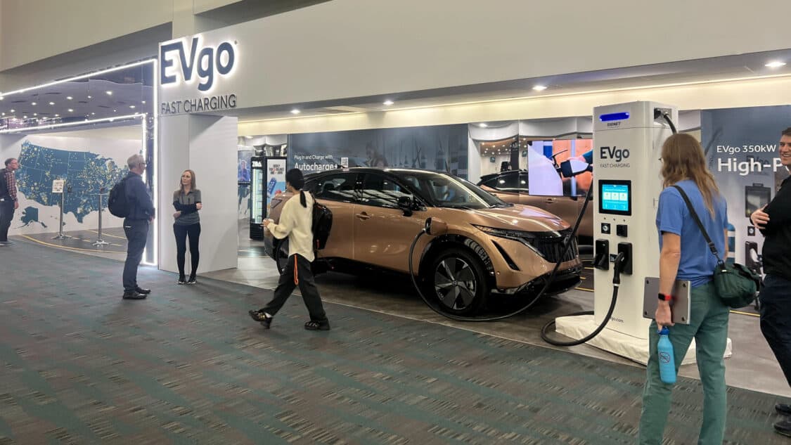 Image showcasing Nissan Ariya at EVgo booth at 2023 LA Auto Show
