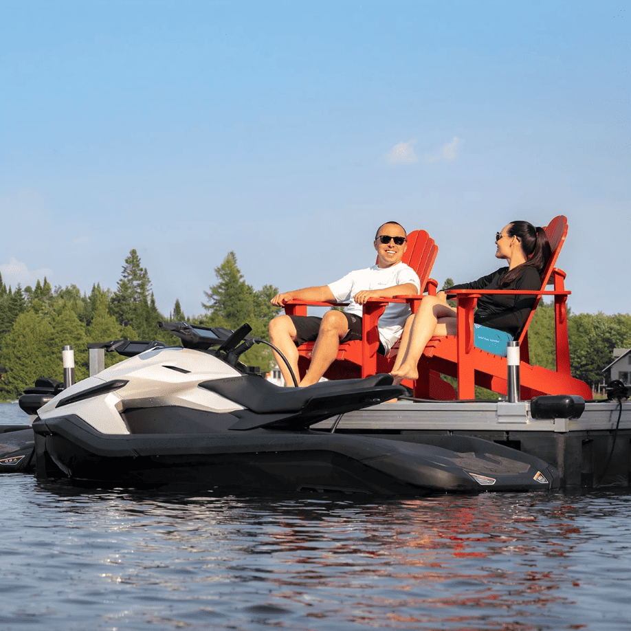 Image showcasing Taiga Orca Carbon electric personal watercraft charging