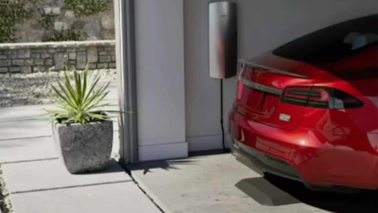 Image showcasing Tesla wireless home charger and charging pad