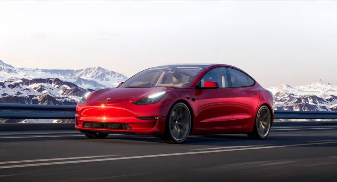 Tesla Model 3 on paved mountain road