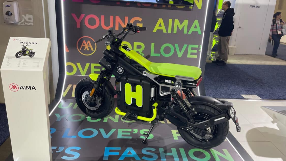 Image showcasing AIMA Hyhawk electric moped at CES 2024