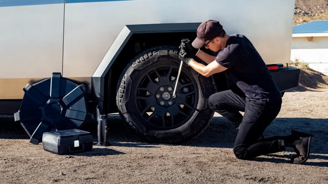 Image showcasing Tesla Cybertruck - spare tire and tools