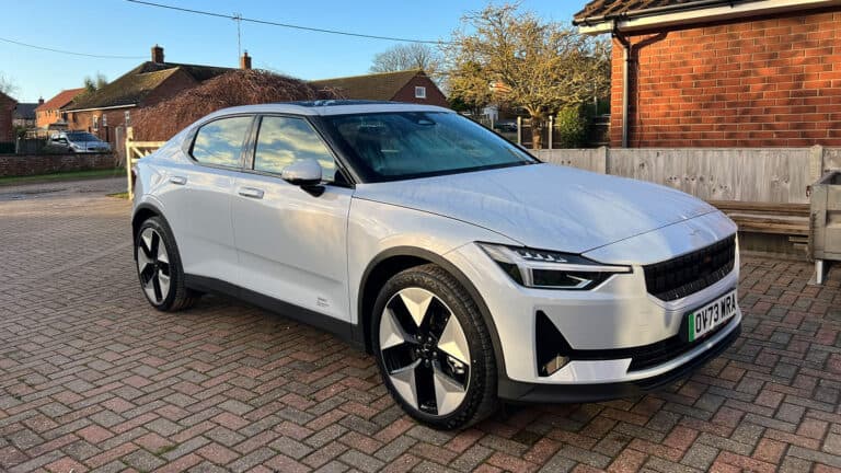 Polestar 2 parked on brick driveway
