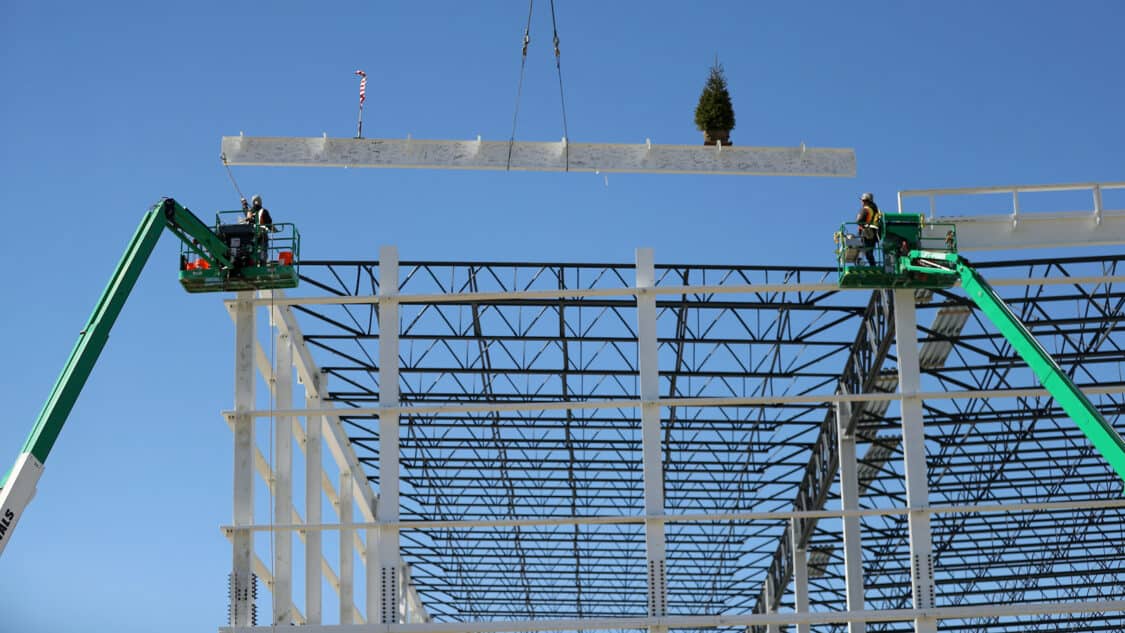 Image showcasing LG Energy Solution and Honda today marked Leap Day by erecting the final structural steel beam at the joint venture's new EV battery production facility being constructed near Jeffersonville, Ohio.