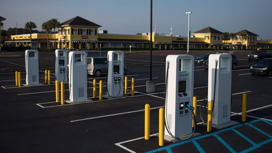 Electrify America EV chargers in large parking lot, Consumer Reports