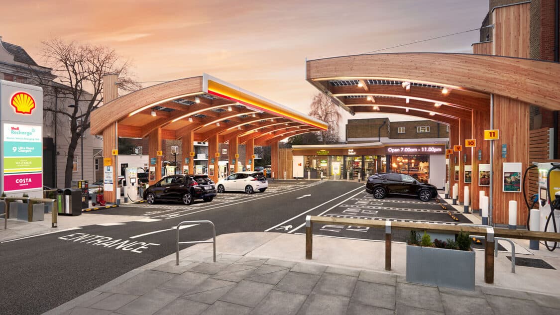 Shell EV charging station with modern design at sunset