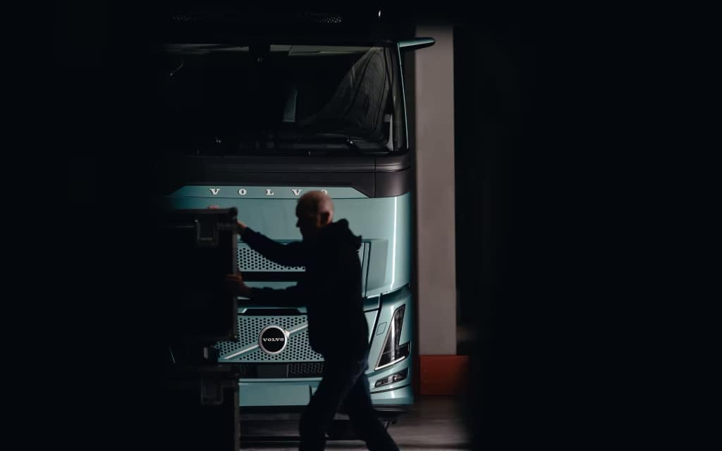 Image showcasing worker unloading the Volvo FH Aero Electric truck