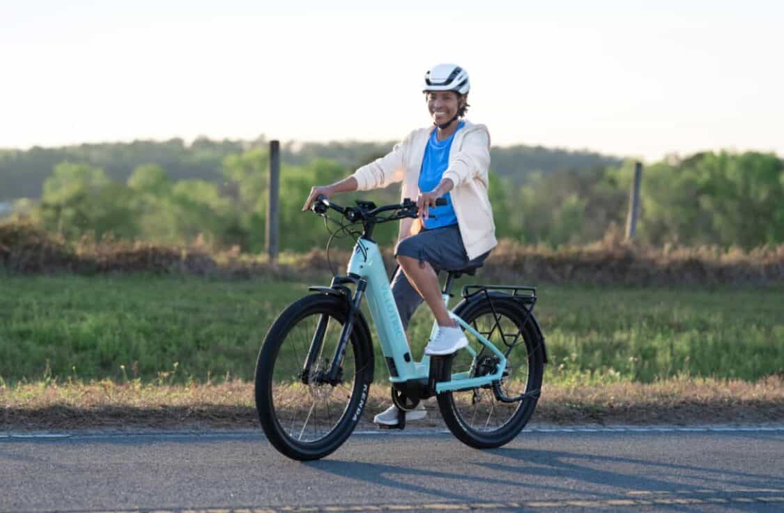Female rider on Mint Velotric Discover 2 electric bike