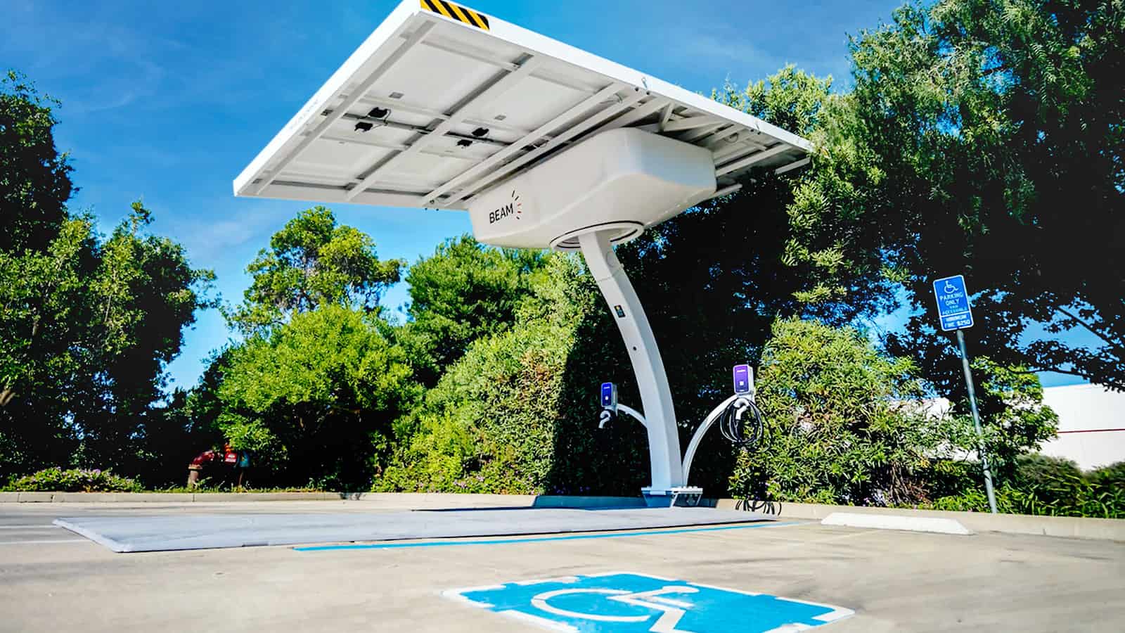 BEAM Global EV charging station, showing two charging ports and the large solar panel above