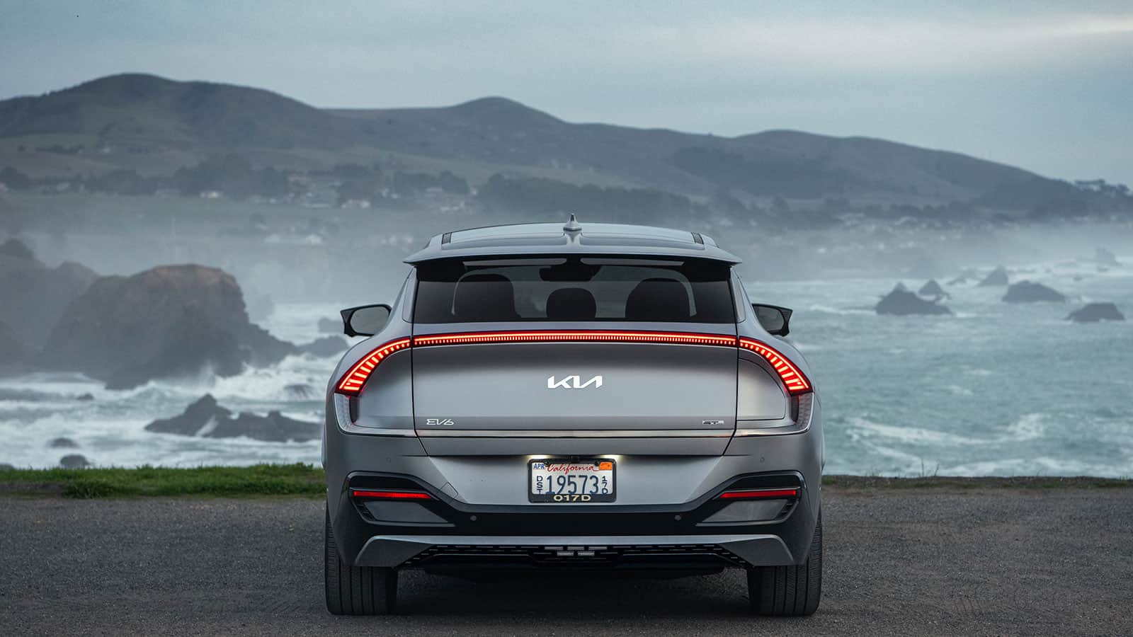 Kia America Sales EV6 parked and looking out at a rough ocean coast