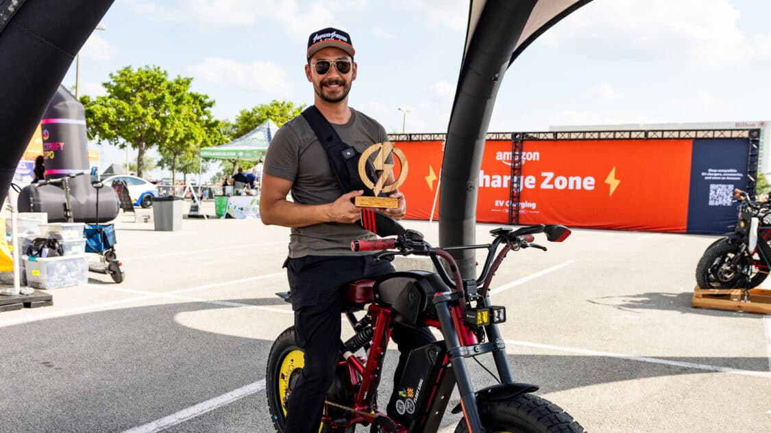 Luis Rolon III holding Best E-Bike award presented by Super73 for his 2020 Super73 RX at Electrify Showoff Orlando