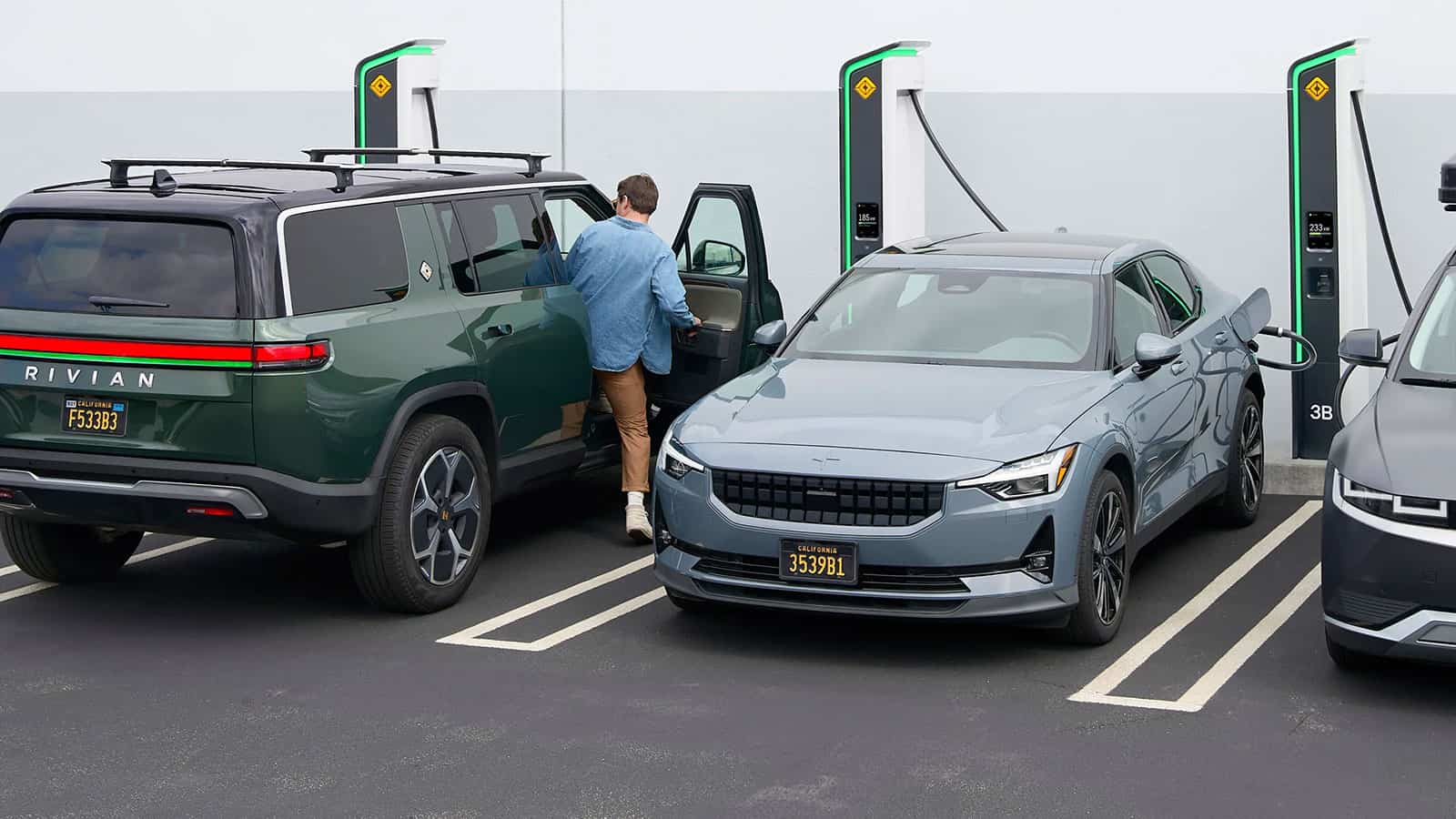 Rivian charging network station with EVs parked and charging
