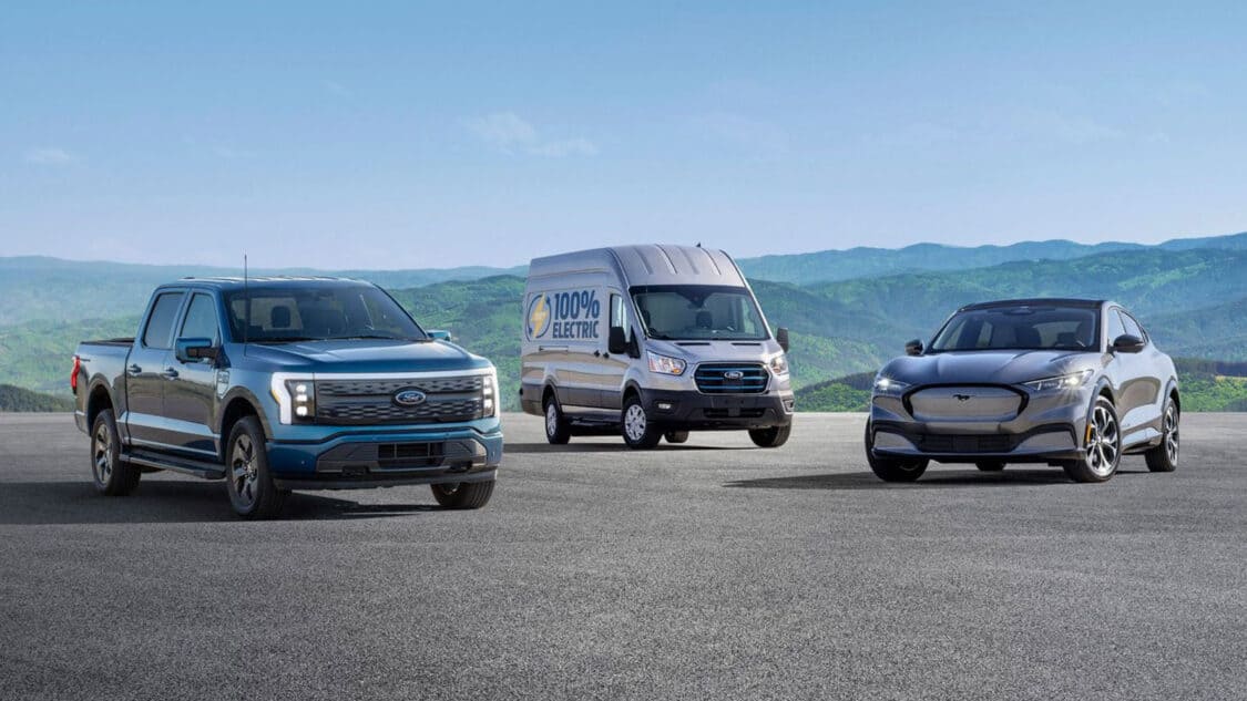 Ford F1-50 Lightning, Ford Pro, Ford Mustang Mach-E parked with view of hills in background, EV Sales