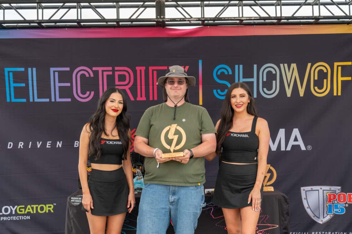 Justin Phelps receiving Best Outdoor Rec award sponsored by Falken Tires at Electrify Showoff Denver